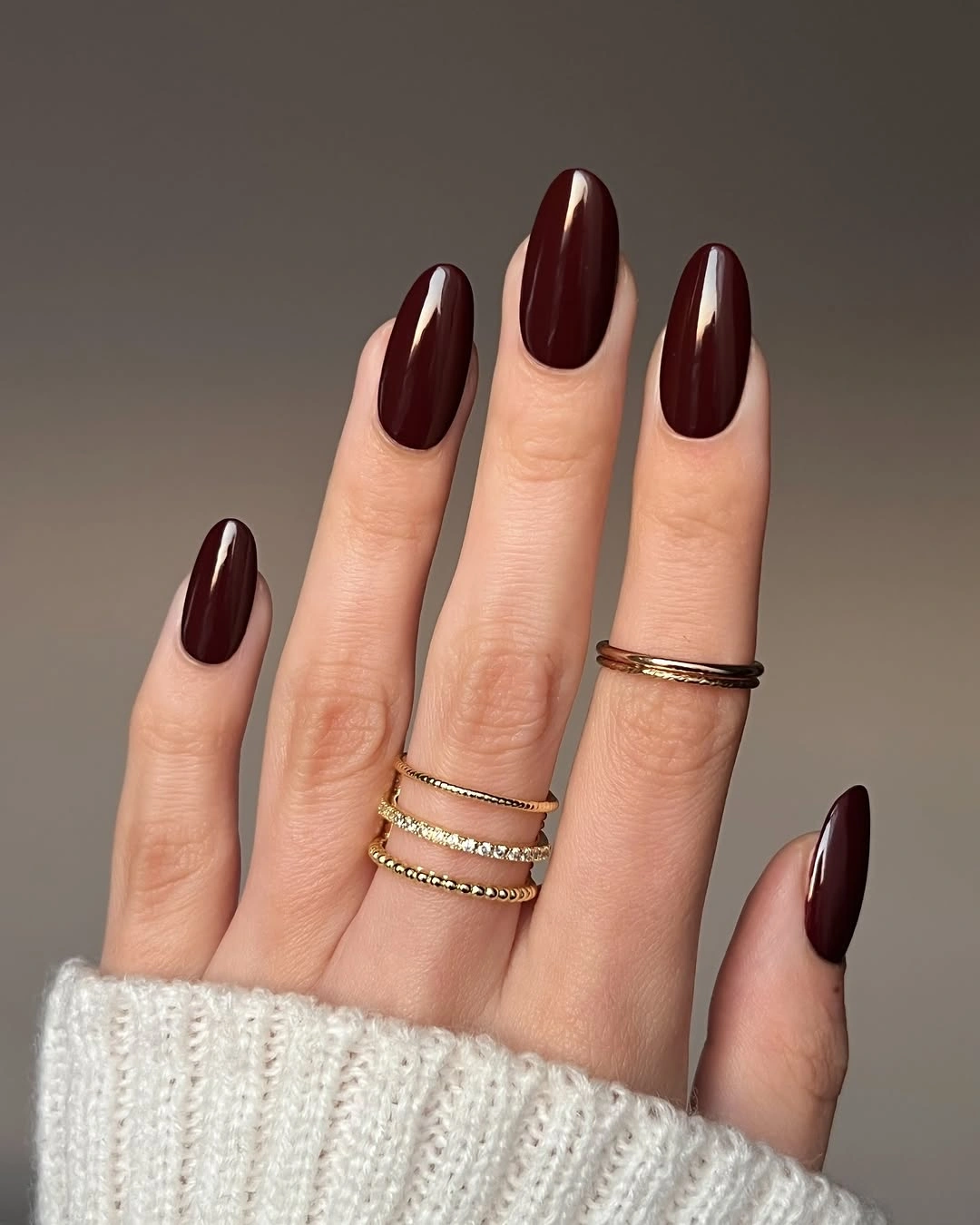 Long deep wine nails with a pale botanical line