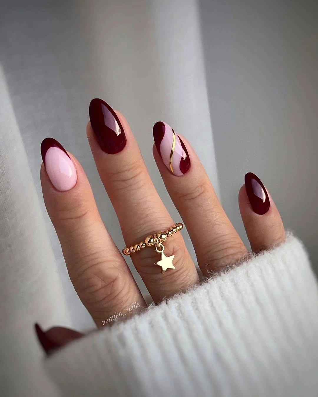 long almond nails with colorful curved fall lines