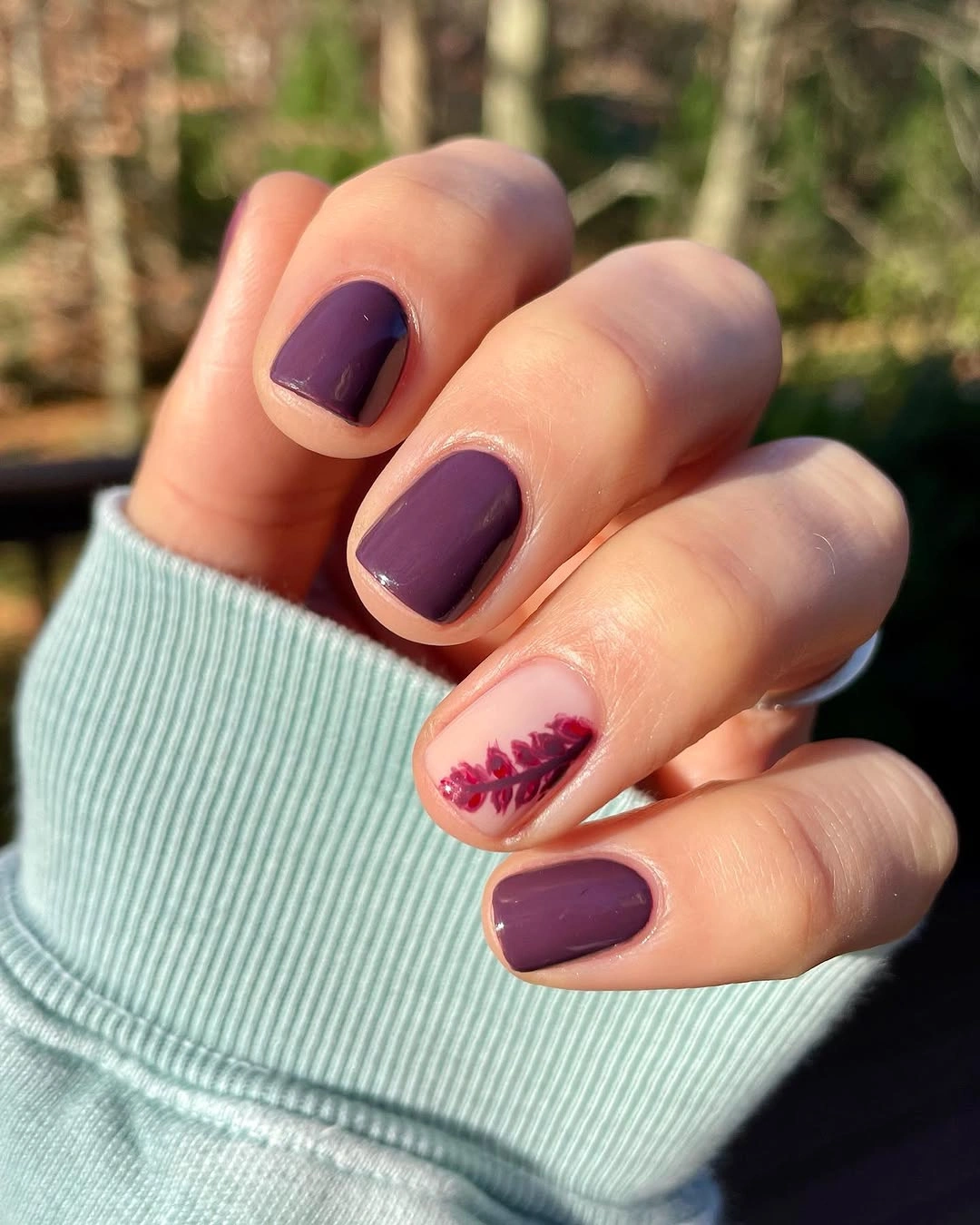 Fall nail idea: short square plum manicure with berry branch accent