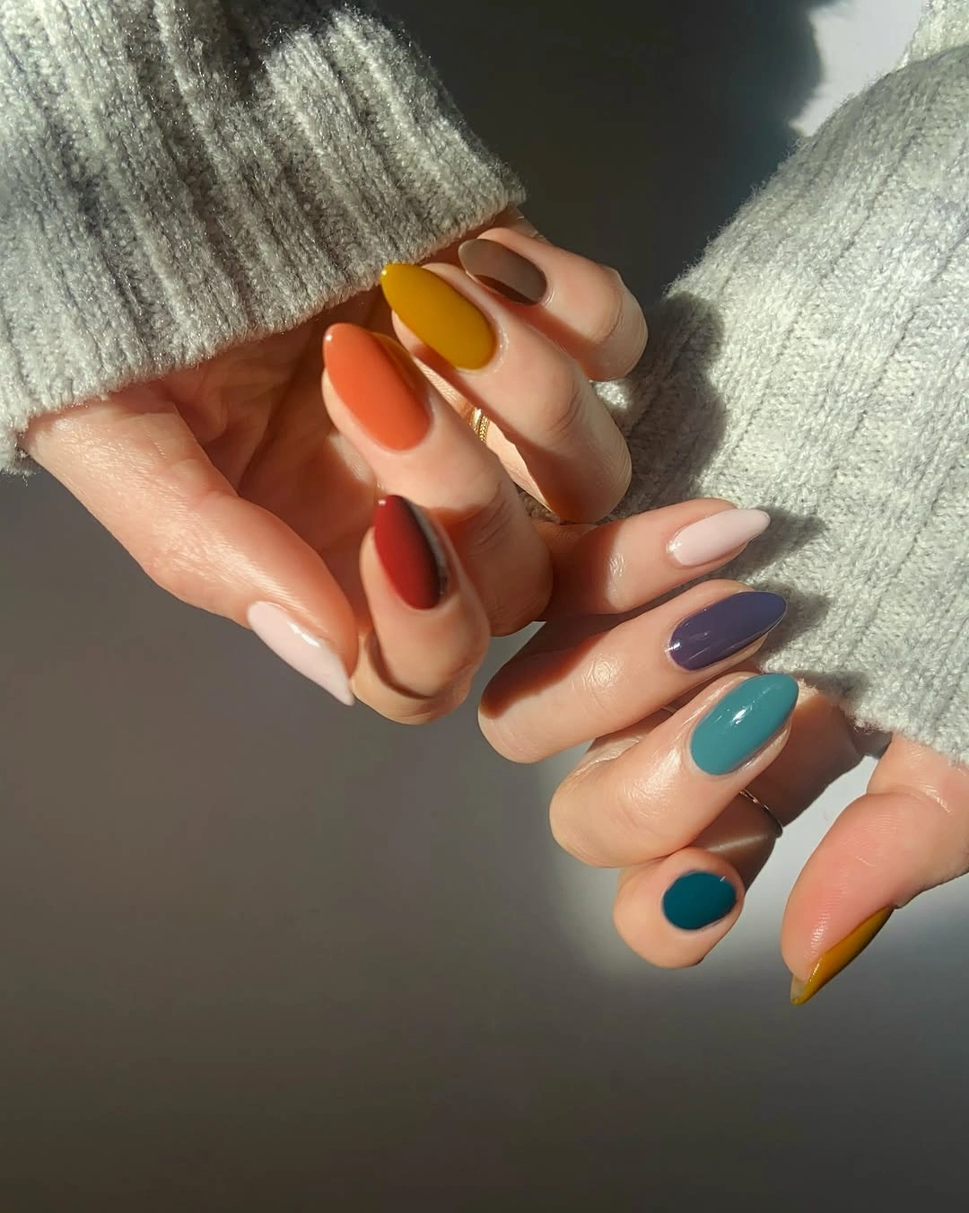 Mismatched warm and cool almond nails