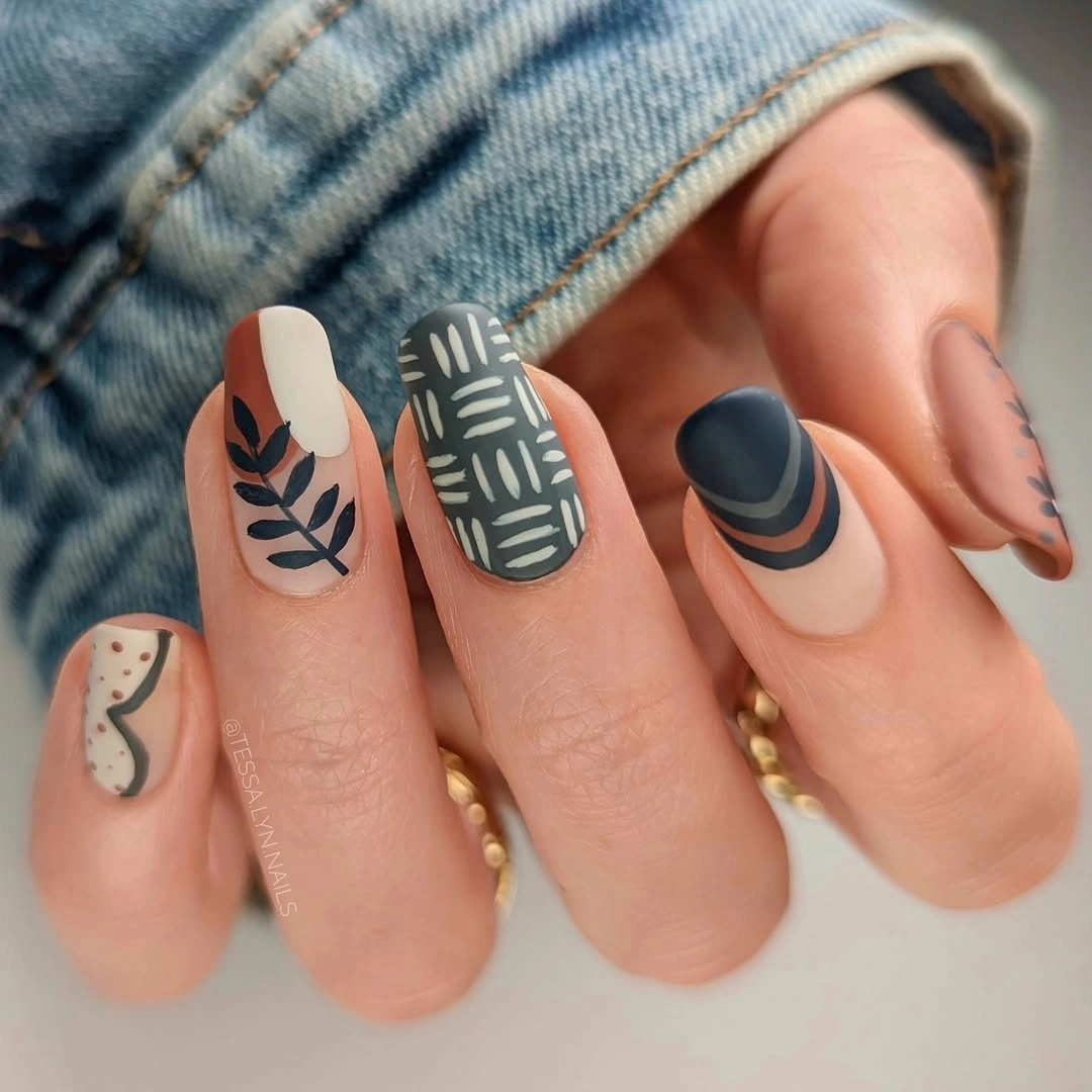 Slate blue leaf almond nails