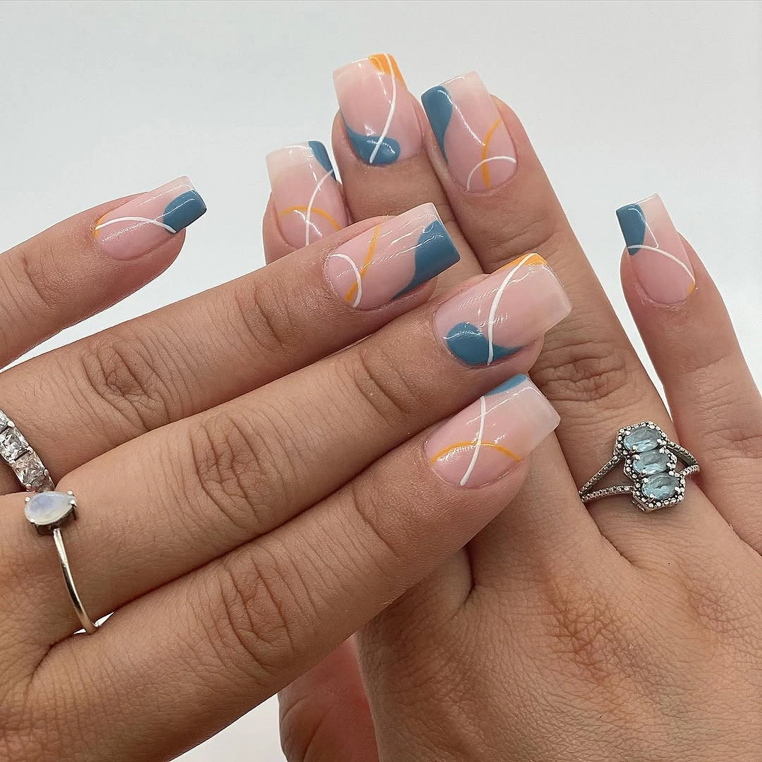 medium square nails with pastel blue yellow and pink blocks