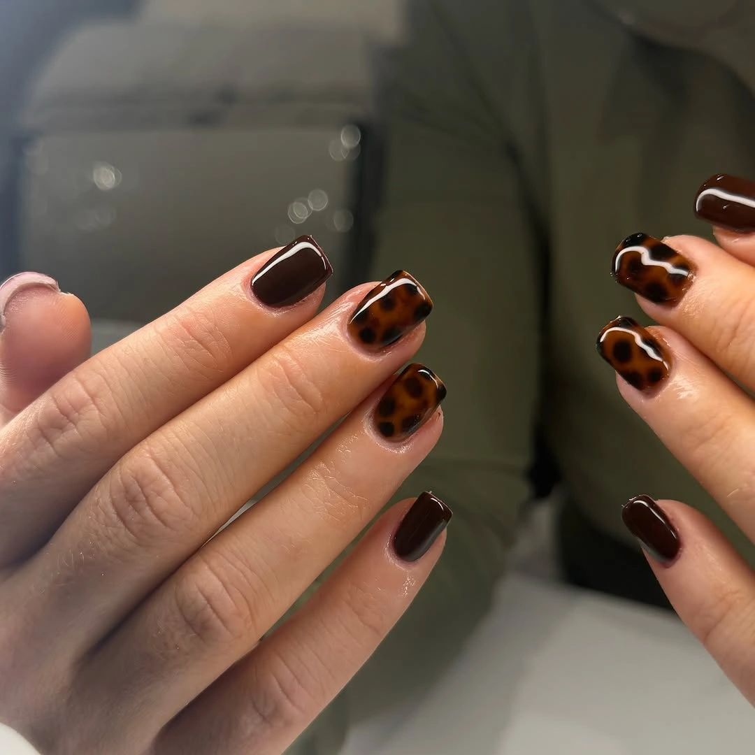 short square chocolate nails with compact tortoiseshell accents