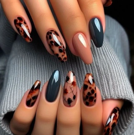 black cream and brown animal spots