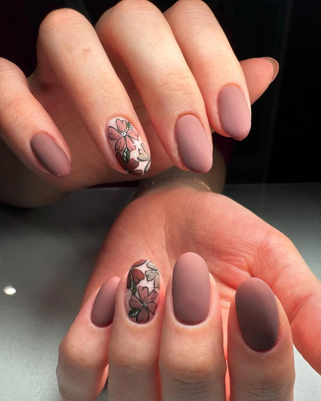 one raised floral nail in matte mauve