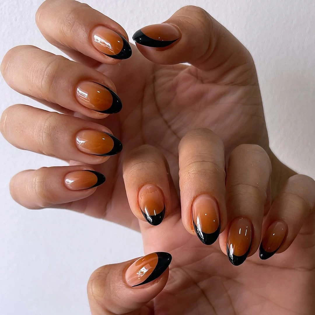 orange to black on pointed nails