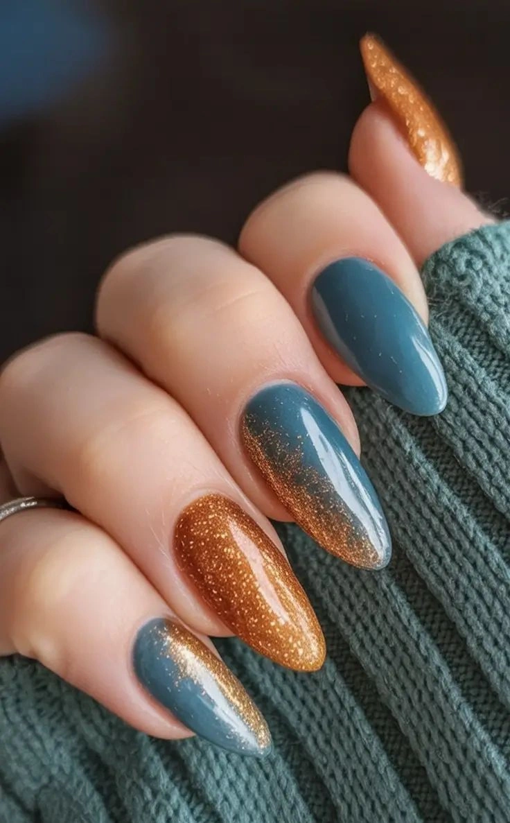 long almond nails with slate blue and bronze shimmer