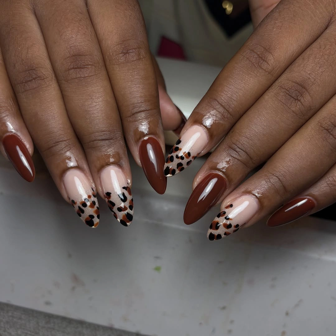 brown and nude almond nails with spotted tip details