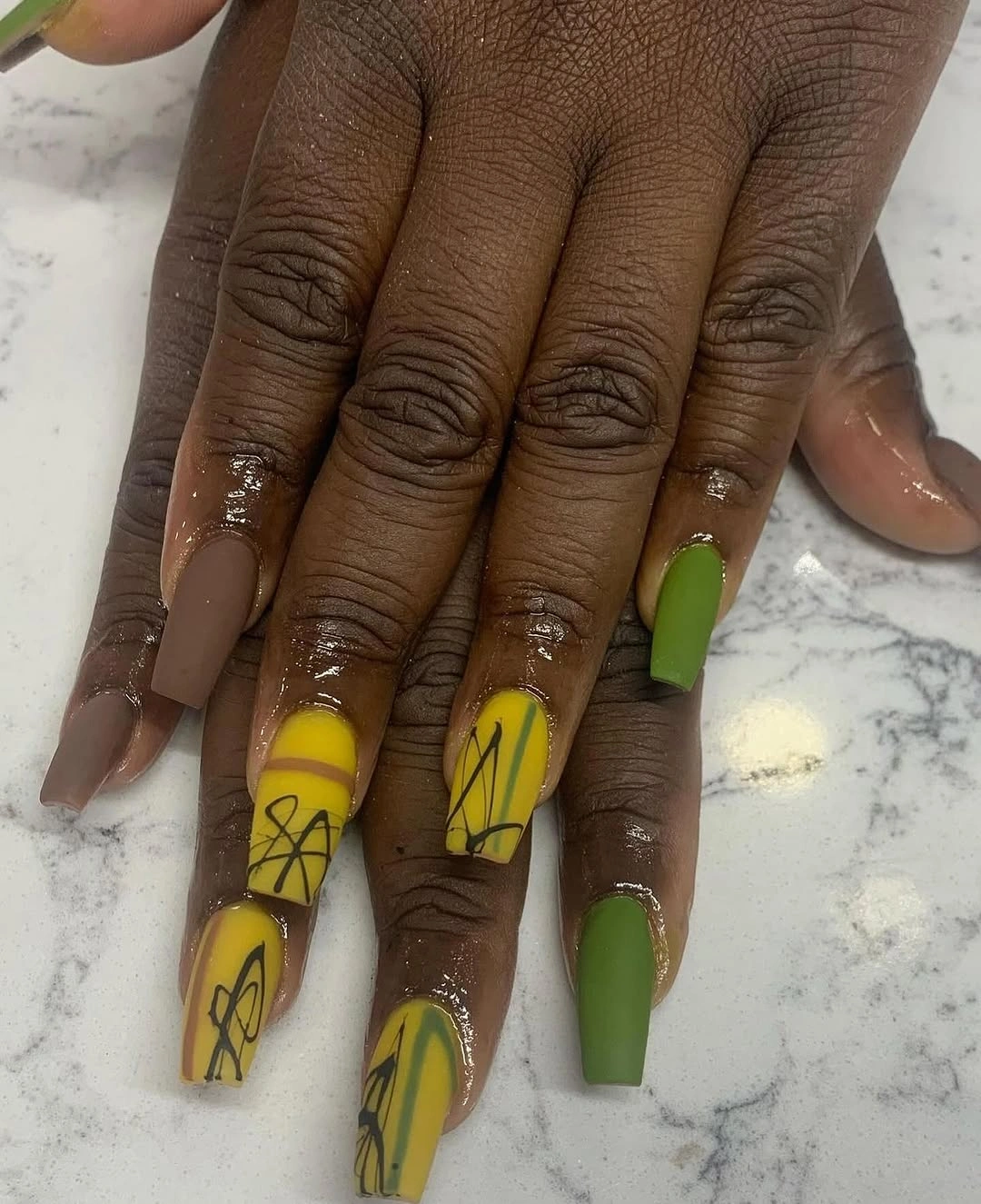 taupe yellow and lime square nails with abstract strokes