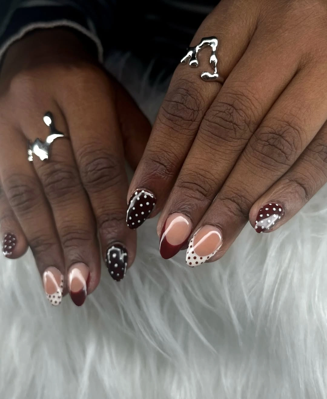 Brown pink almond nails with spotted and dotted accents