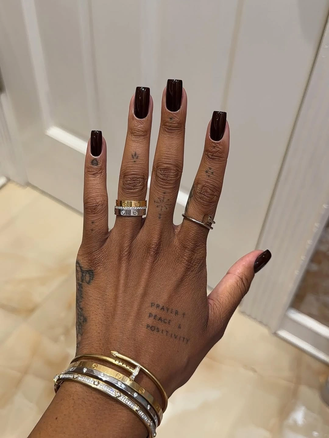 long nude square nails with deep brown tips