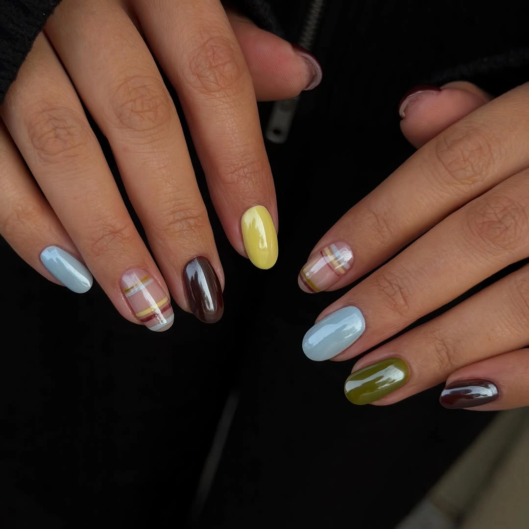 Pastel blue yellow olive and brown almond nails