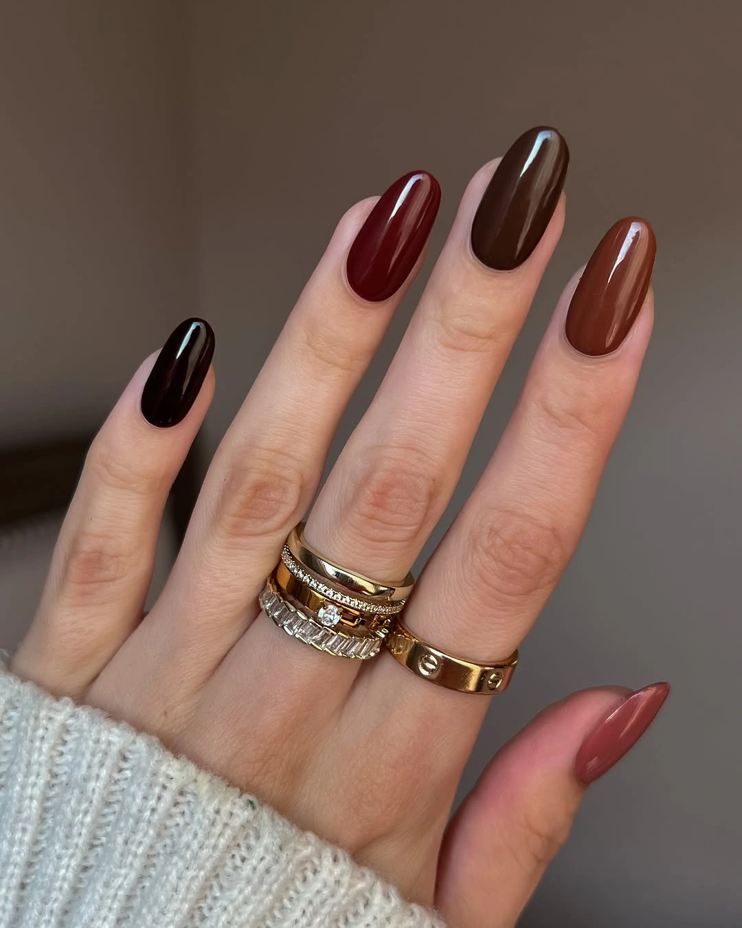 black medium oval nails with tonal color progression