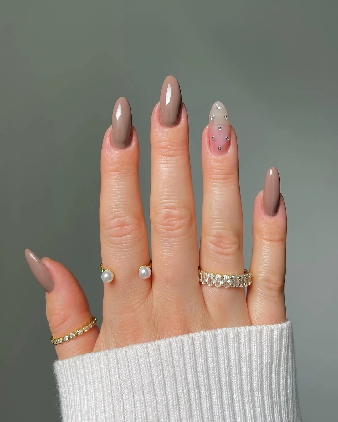 pale pink long almond nails with burgundy curved tips