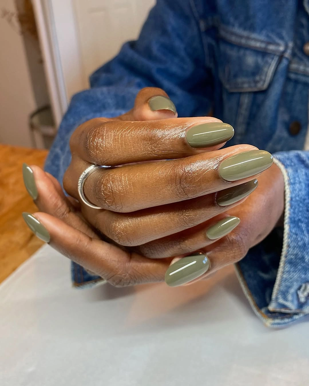 sage olive green medium almond nails with single sage shade