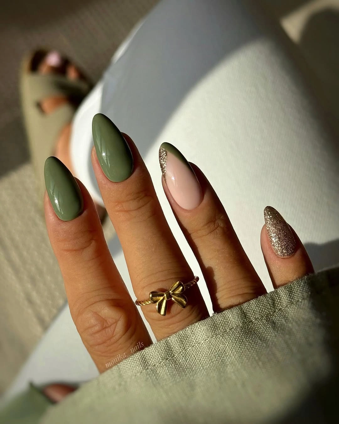 olive green long almond nails with olive with glitter accent