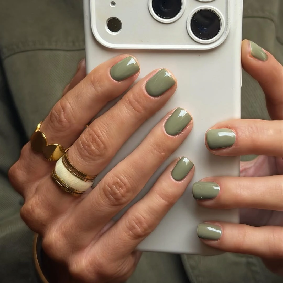 muted olive green short rounded nails with single olive shade