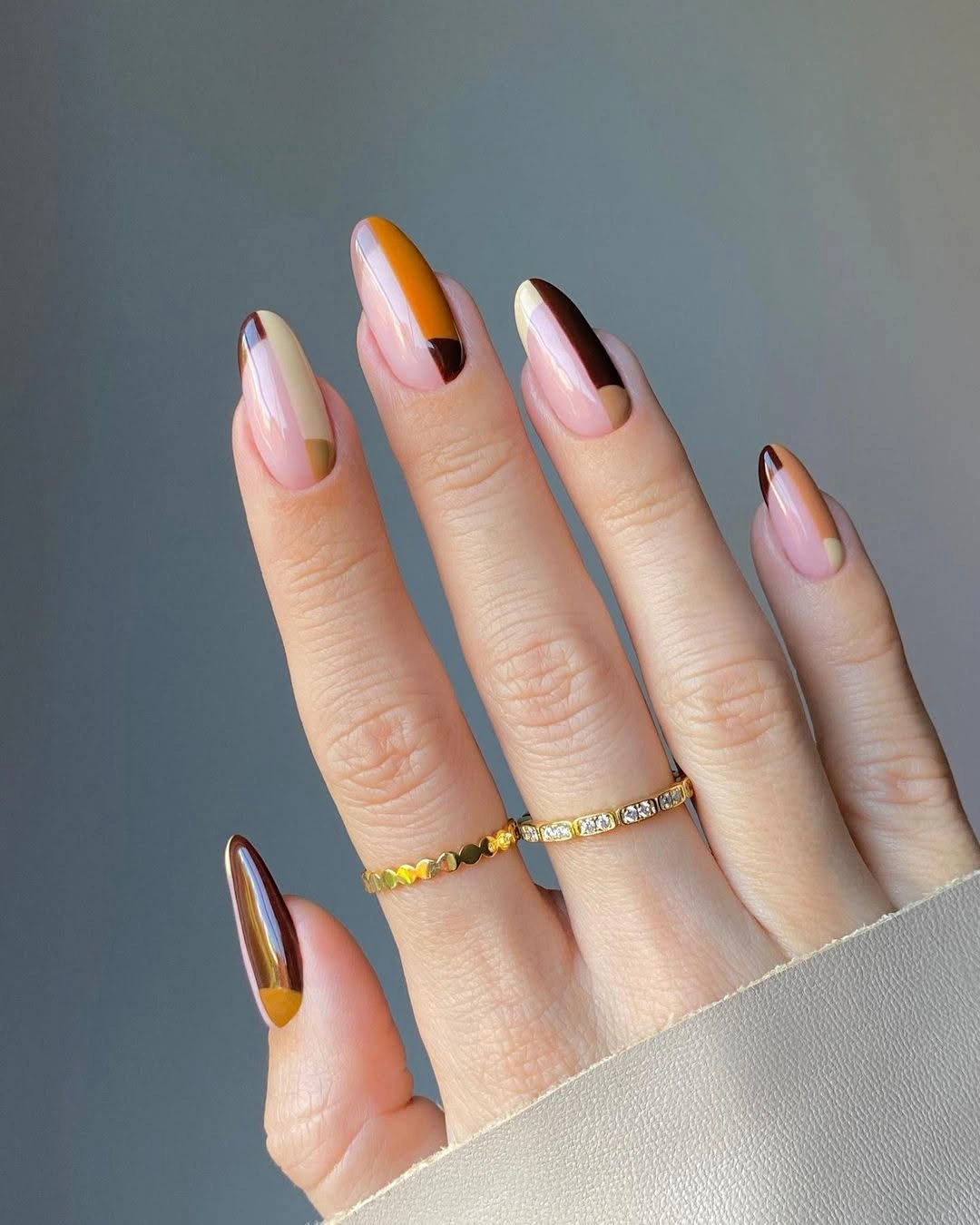 pale pink long almond nails with curved warm tips