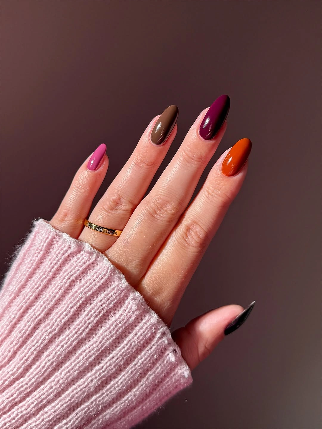 chocolate long almond nails with jewel-tone alternation