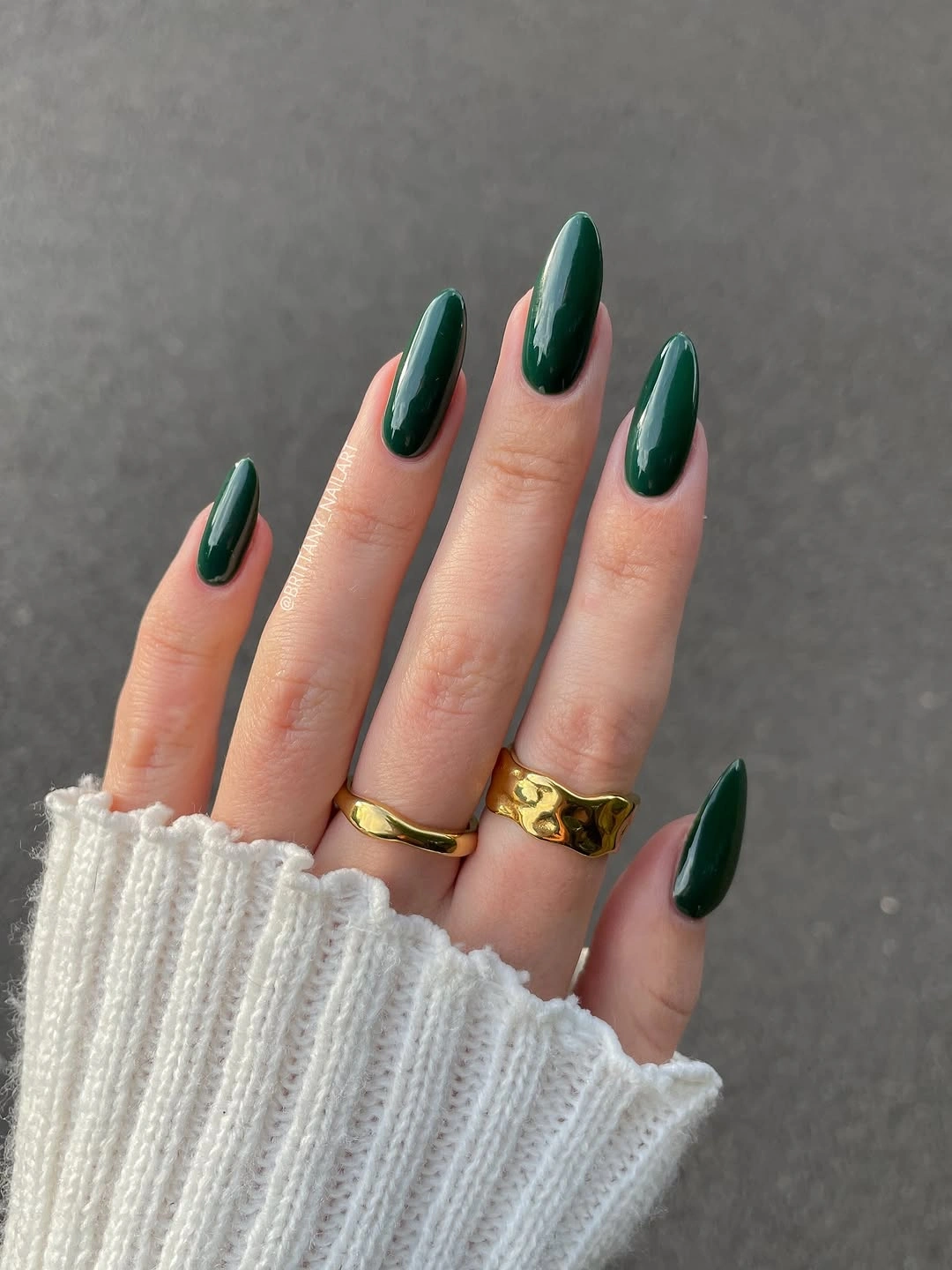 Fall nail idea: long almond forest-green manicure