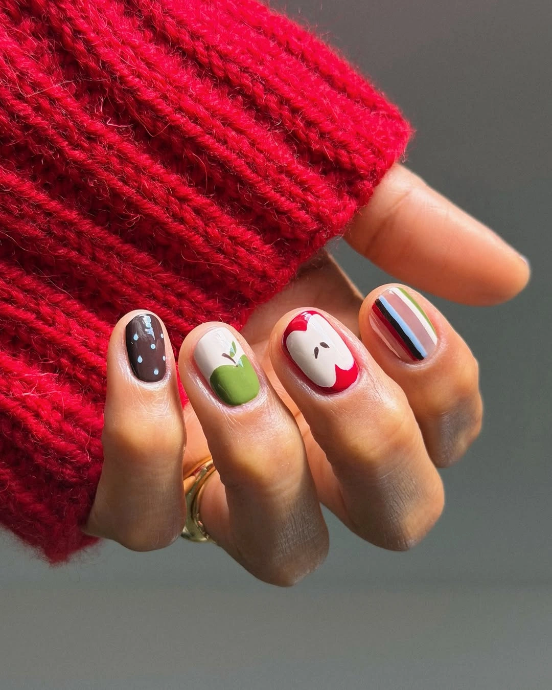 Fall nail idea: short rounded mismatched seasonal manicure