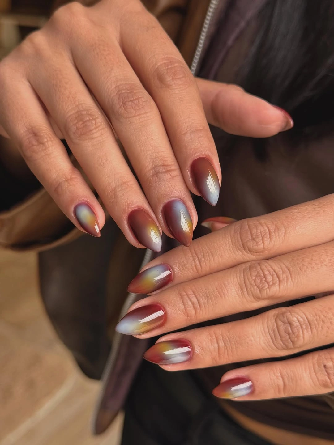 Fall nail idea: charcoal almond nails with a subtle tonal floral pattern