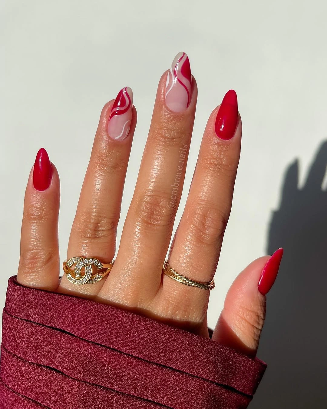 Red nails with pink line art