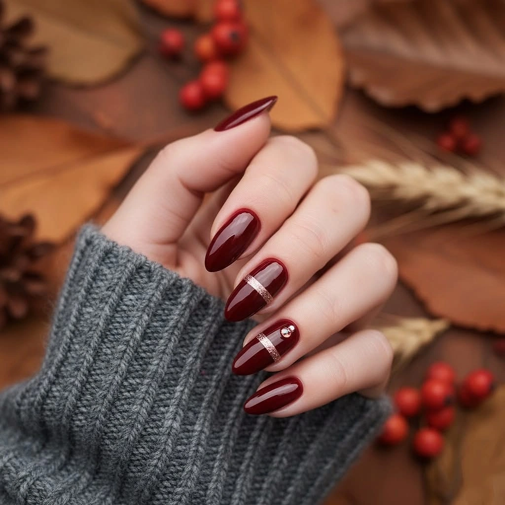 Burgundy nails with thin white stripes
