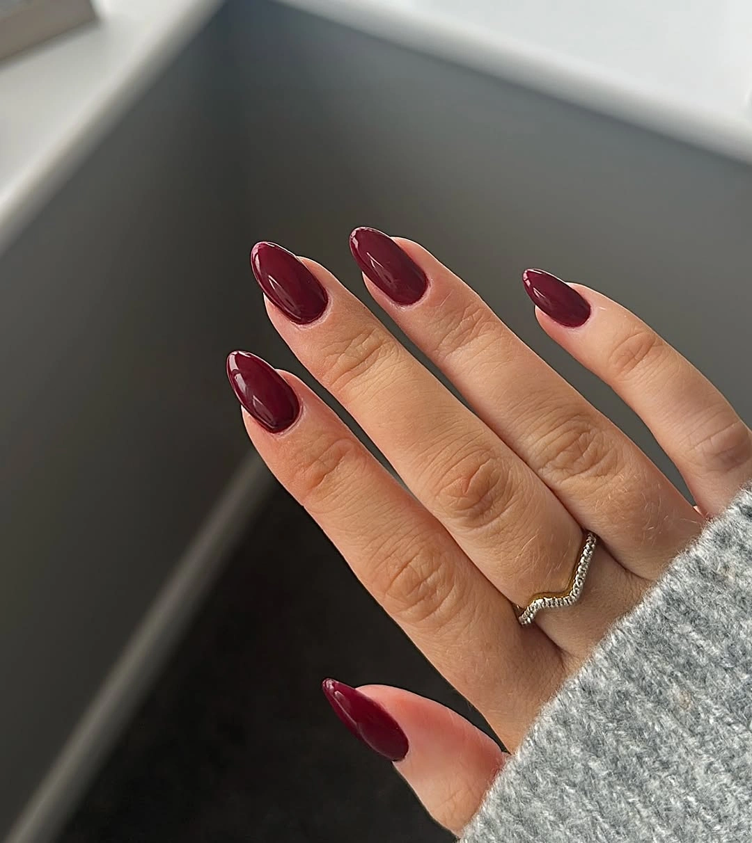 Wine red almond nails with shine