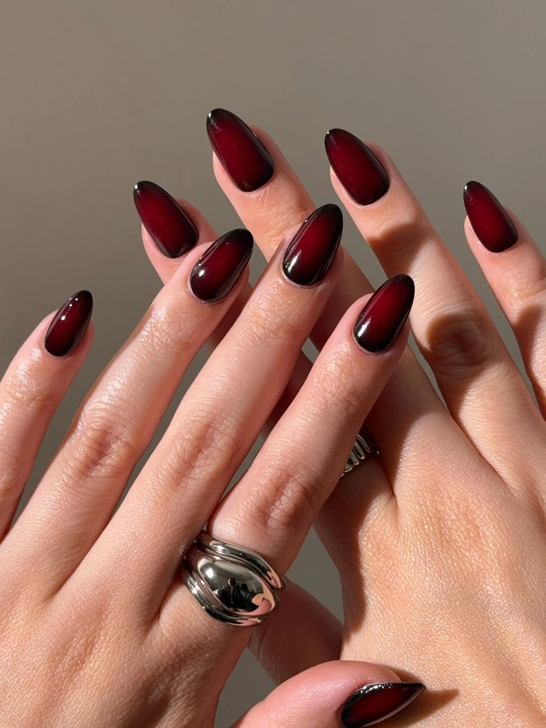 Black to red ombre almond nails