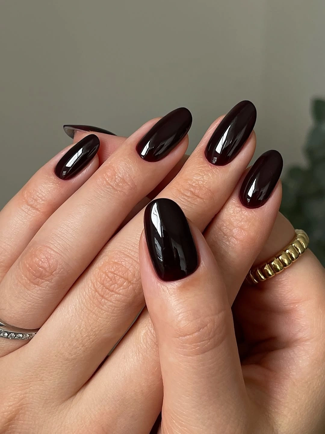 short wine almond nails with one floral accent