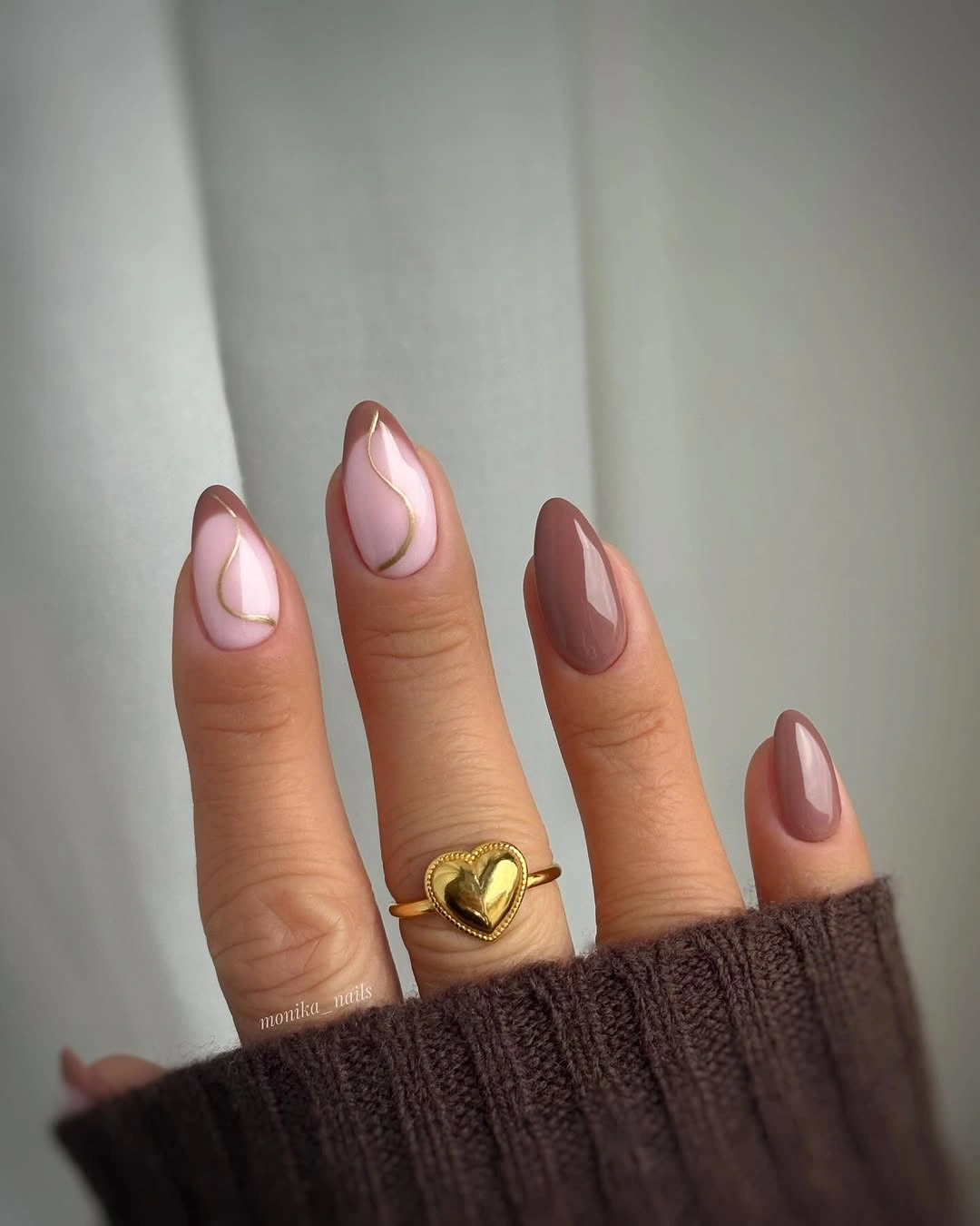 short almond nails with brown mauve checker accents