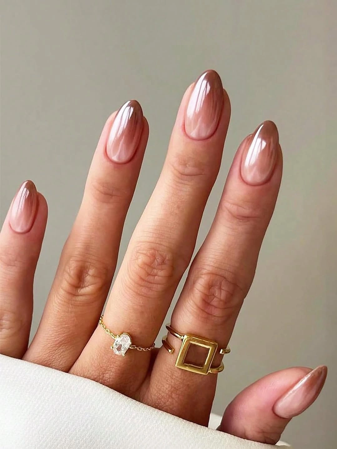soft pink short almond nails with glossy finish