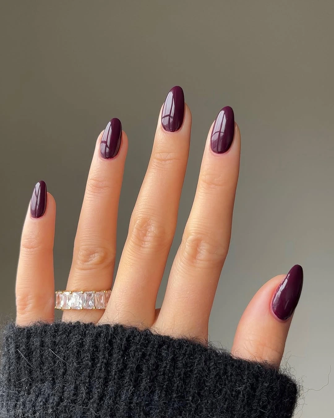 short deep plum almond nails with glossy shine