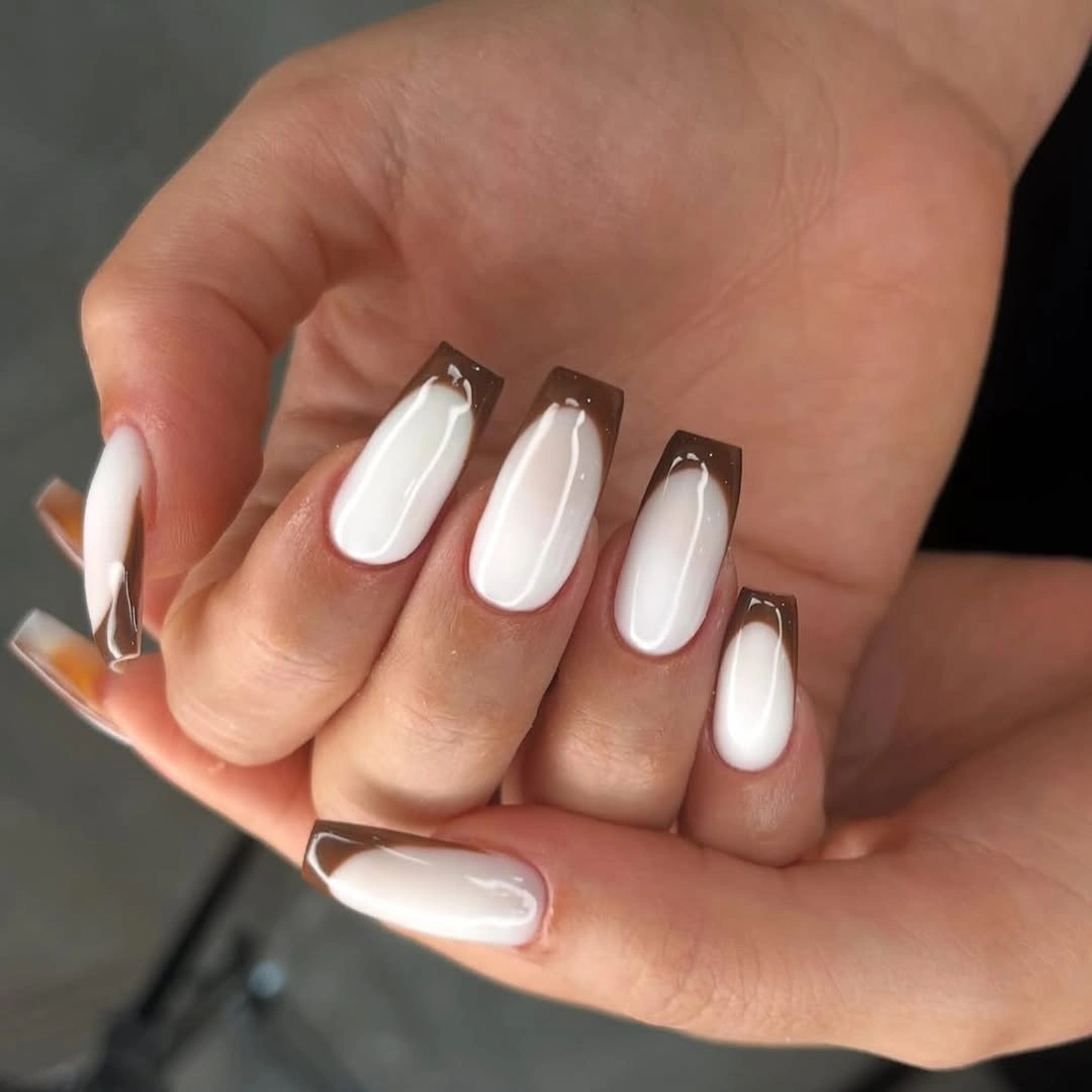 medium square white nails with chocolate-brown edge framing