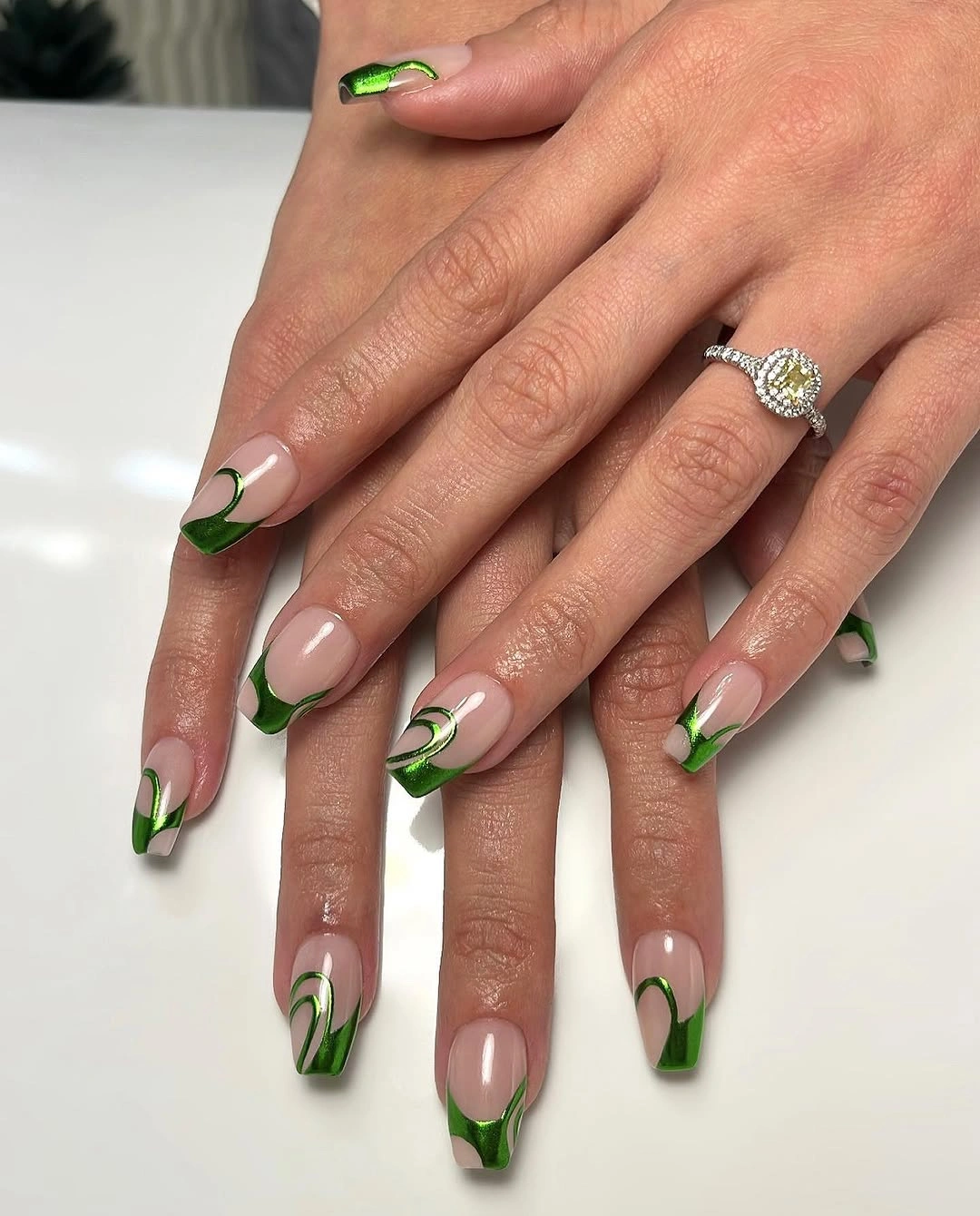 short nude coffin nails with green French edges