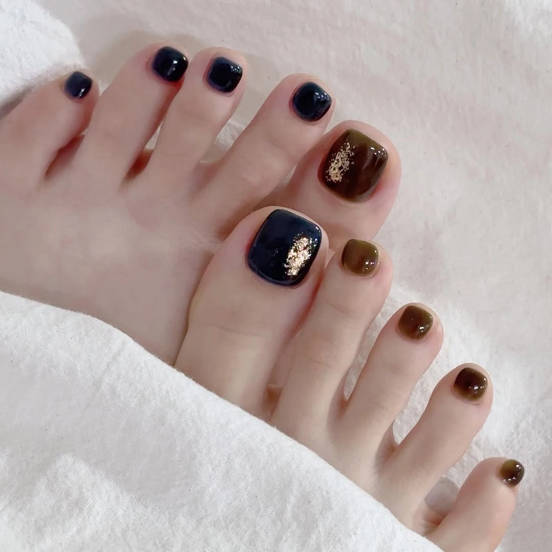 Glossy brown and inky blue toes with bright accents