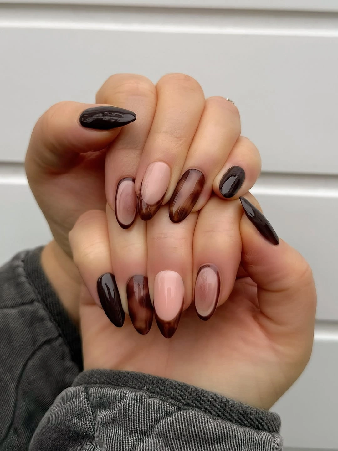 Medium oval nails with soft brown and black edges