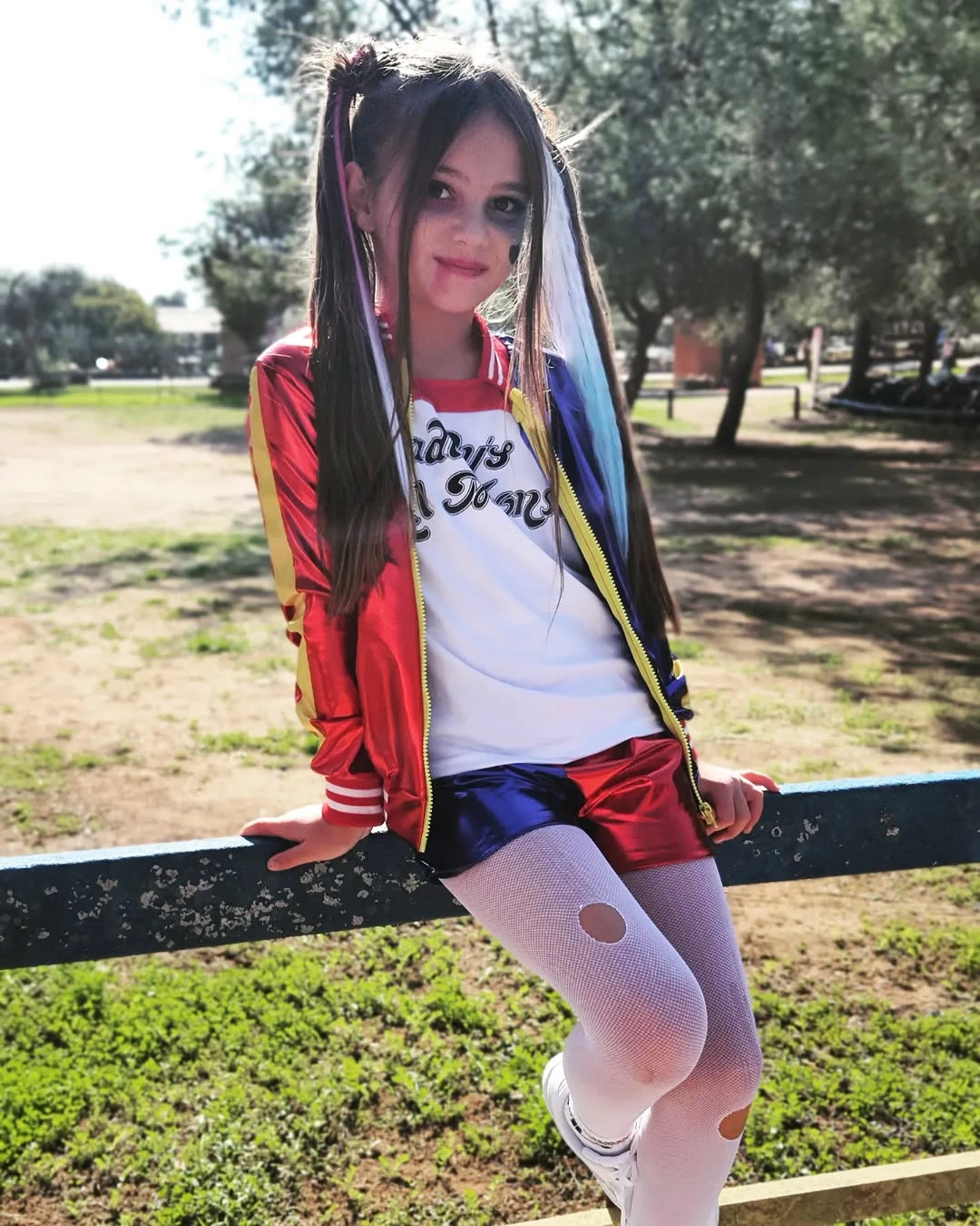 red outfit with shorts-and-tee base with open jacket and fitted tights