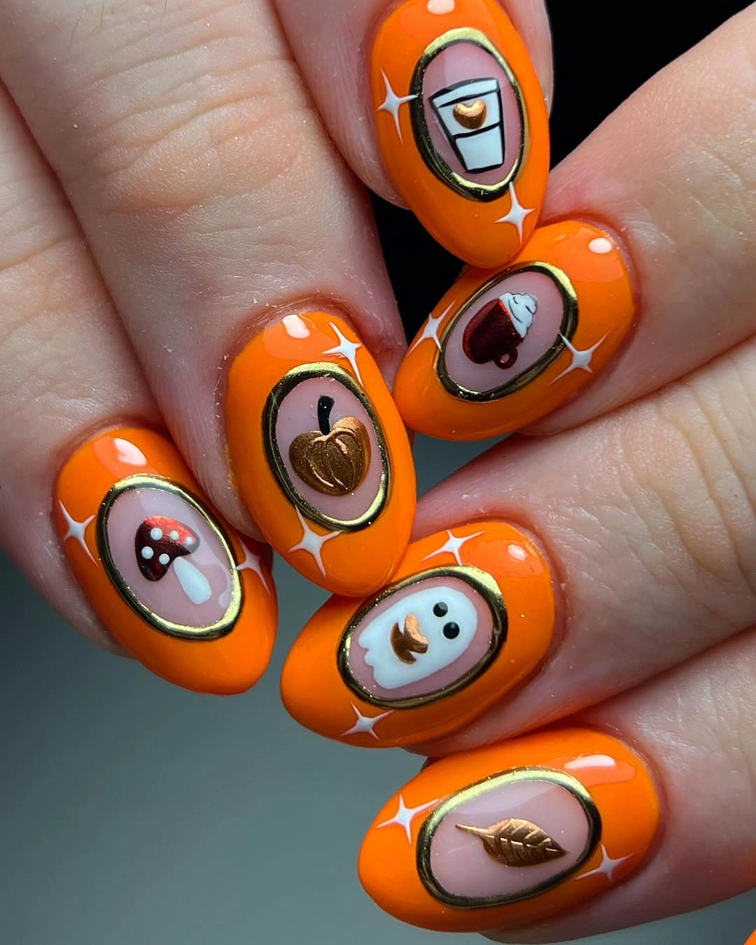 Short oval orange borders with framed Halloween icons