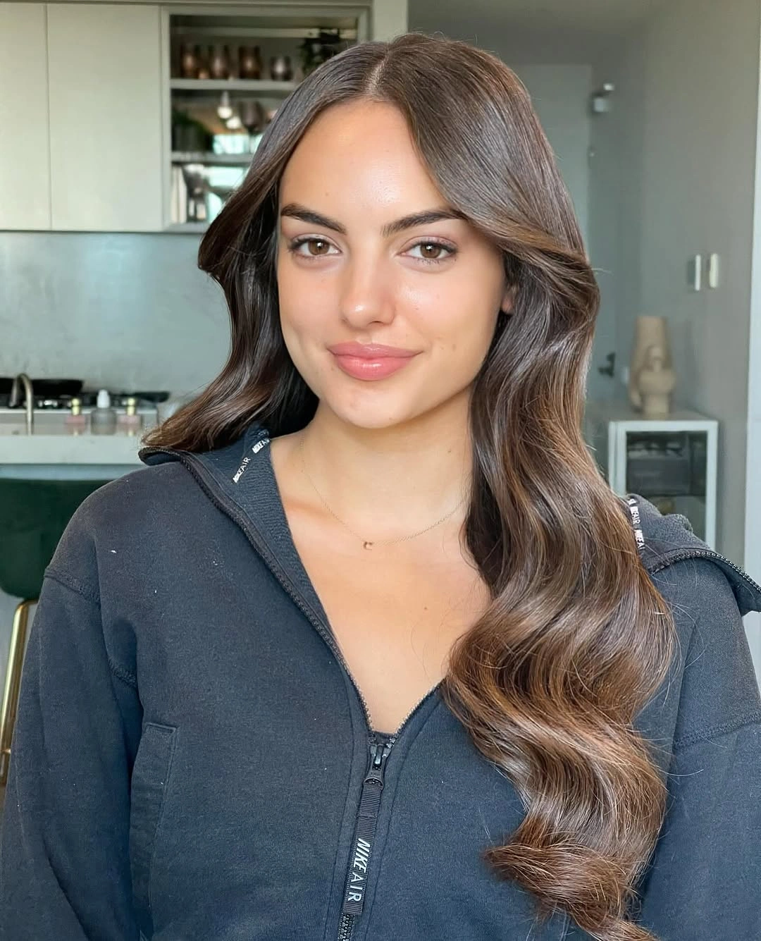 long brown center-parted waves with soft face framing