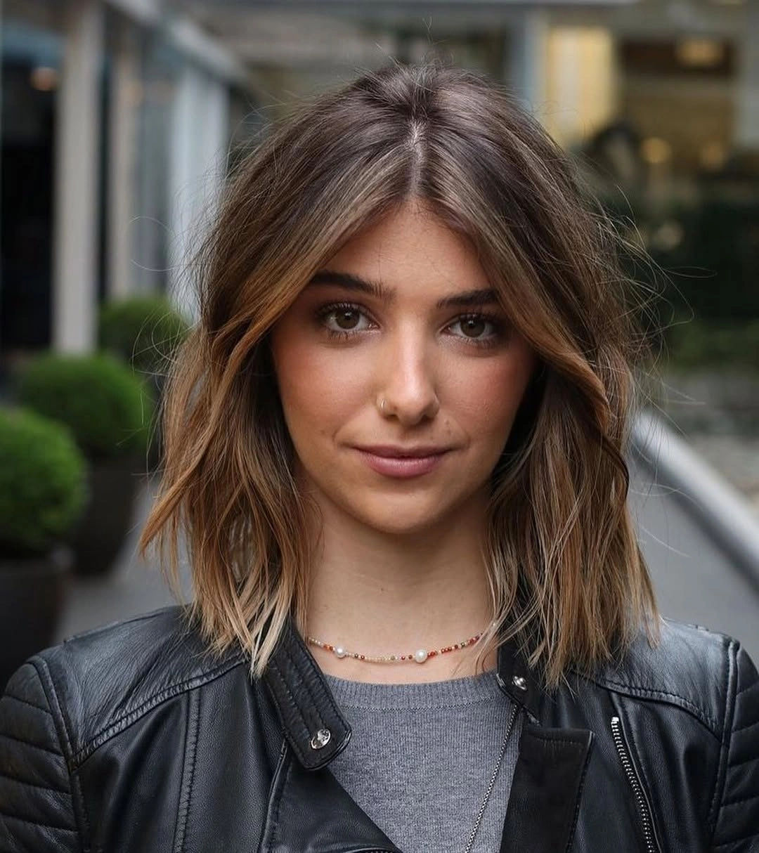 medium brown shaggy layers with a center part