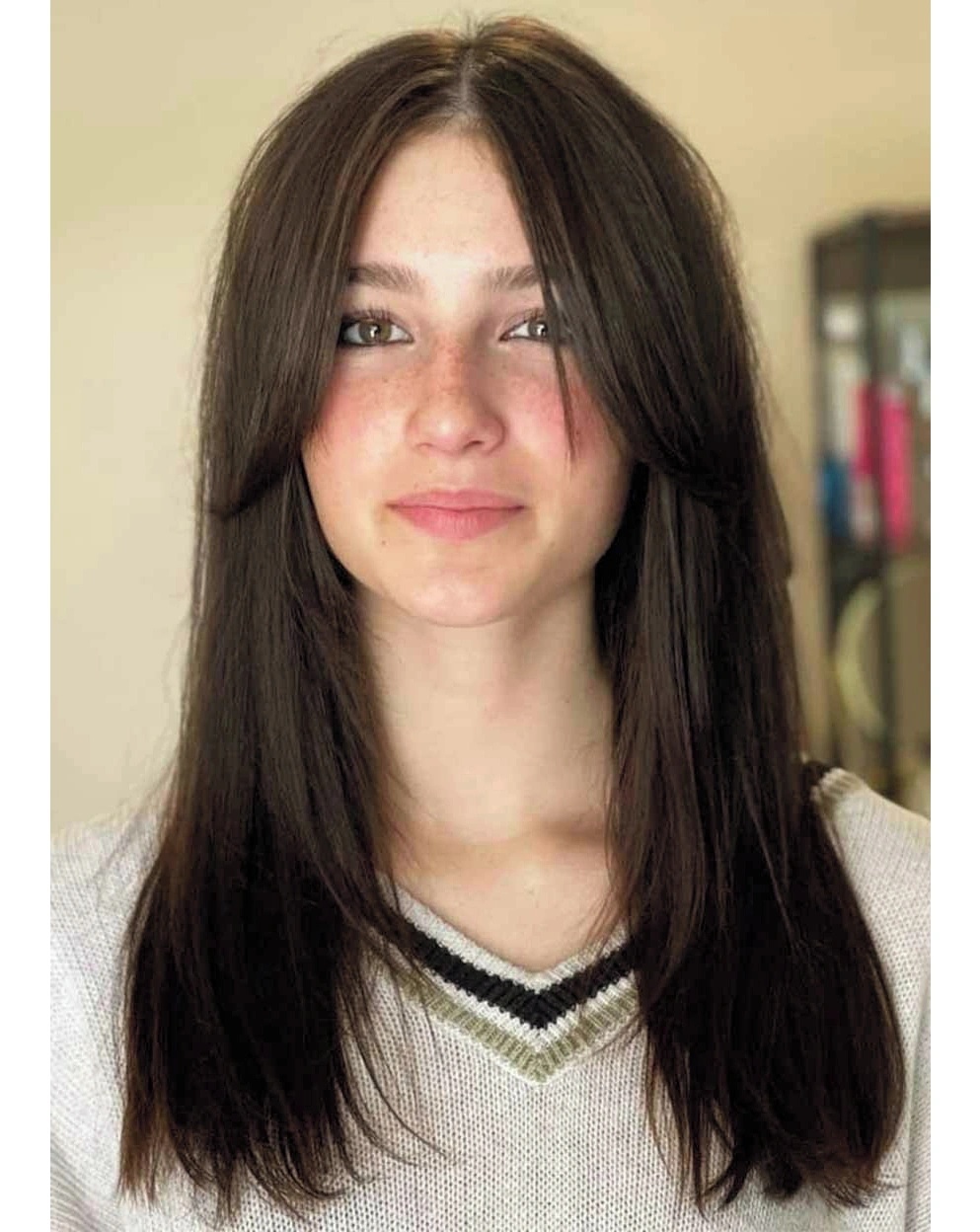 very long straight dark hair with a clean middle part