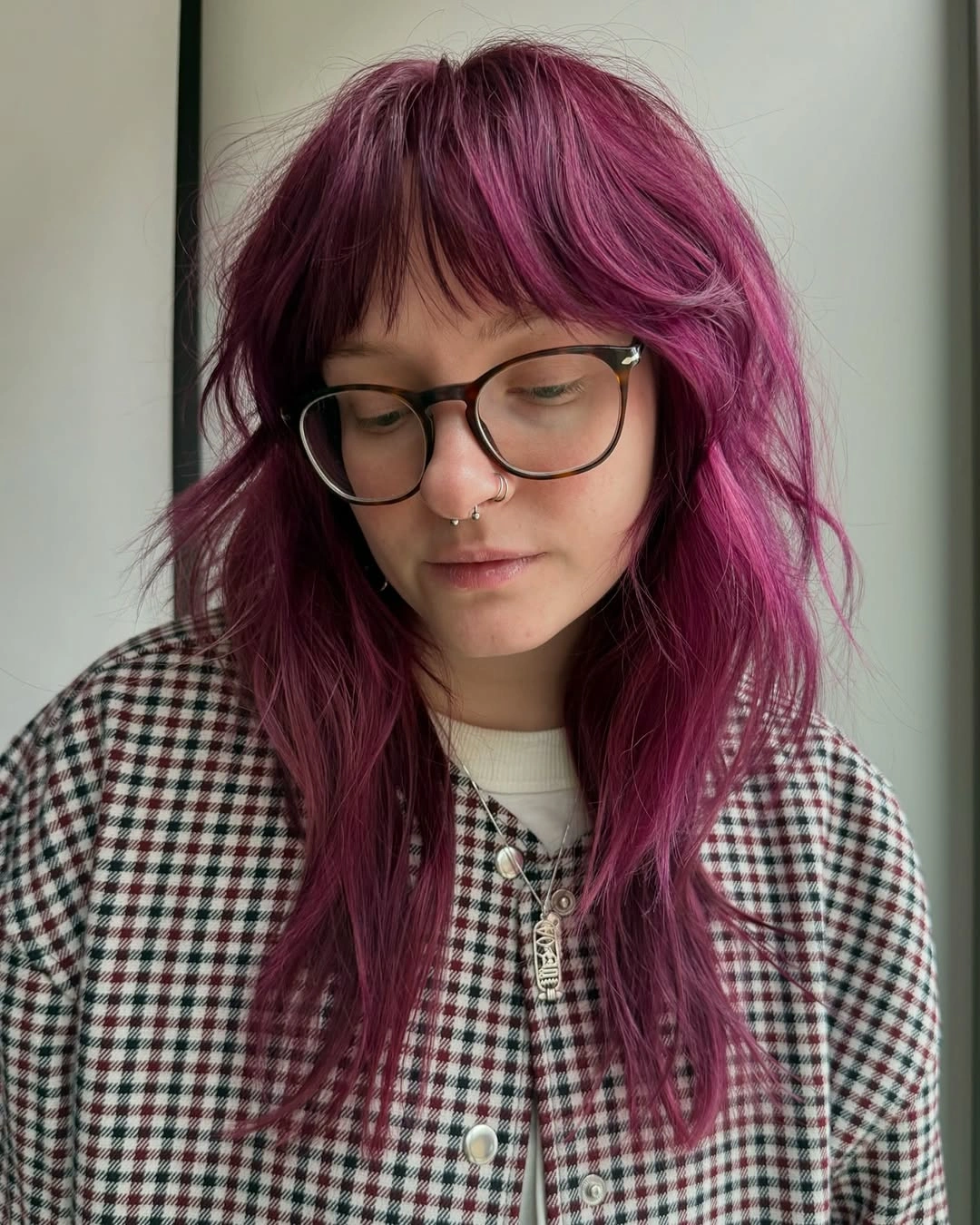 magenta shoulder-length layered waves with side fringe with single vivid magenta color