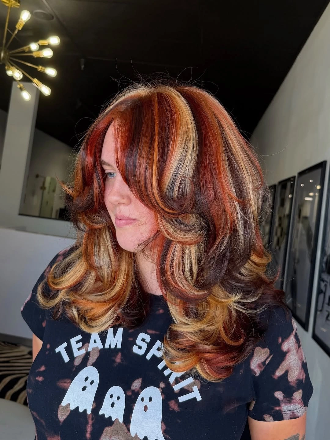 auburn shoulder-length layered waves with curtain fringe with light curtain ribbons