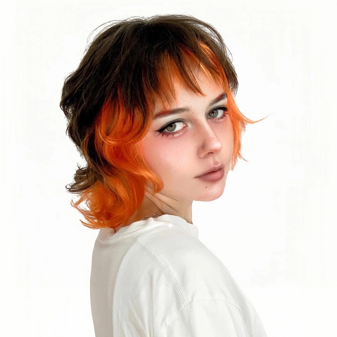 dark brown short layered bob with fringe with orange face panels