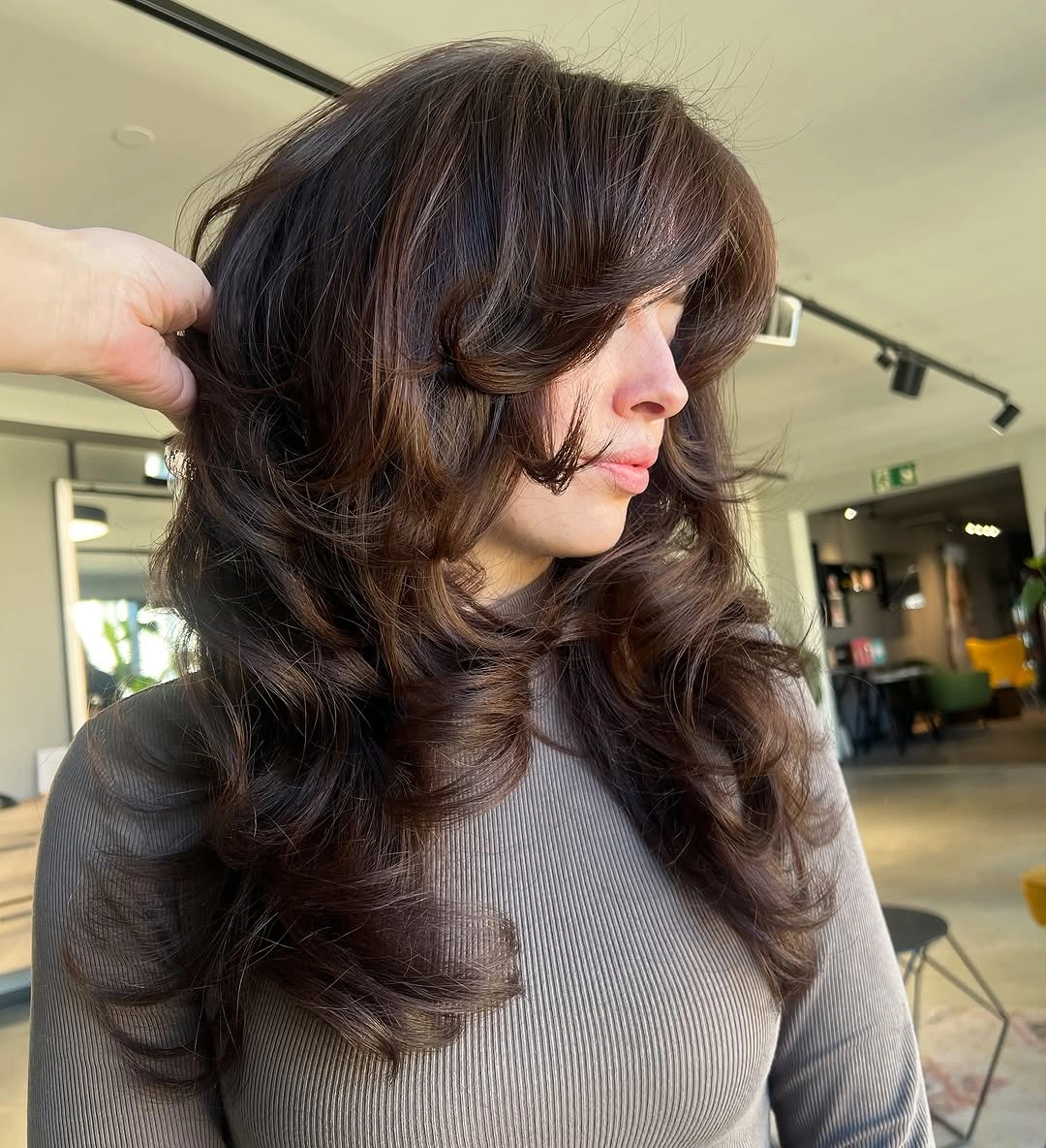 dark brown long layered cut with curtain fringe with curtain framing