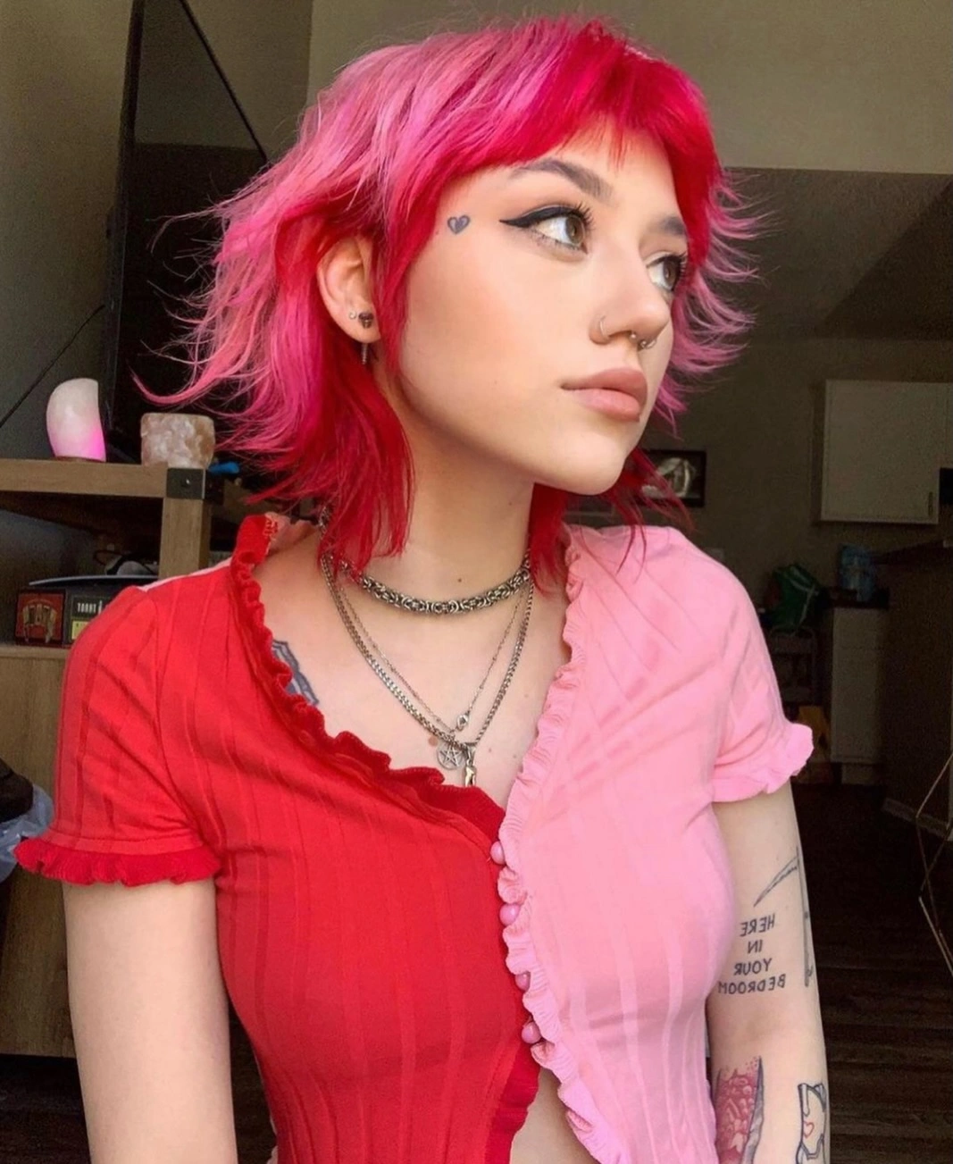 hot pink short shaggy bob with short fringe with short fringe