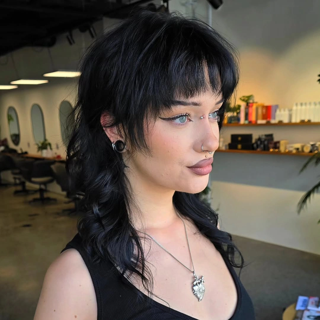 black medium shag with wispy fringe with choppy fringe