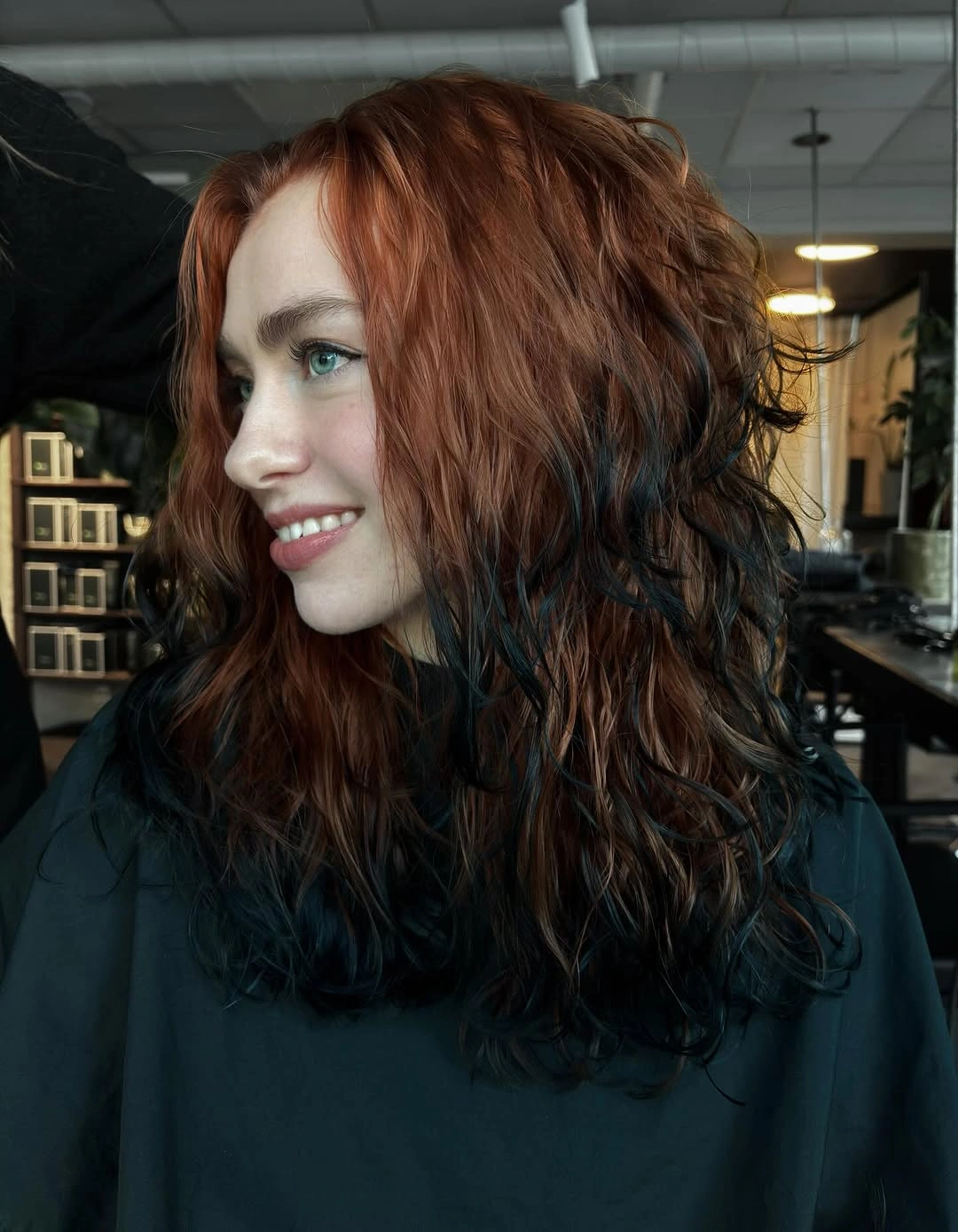 auburn red long layered waves with warm top over dark lengths